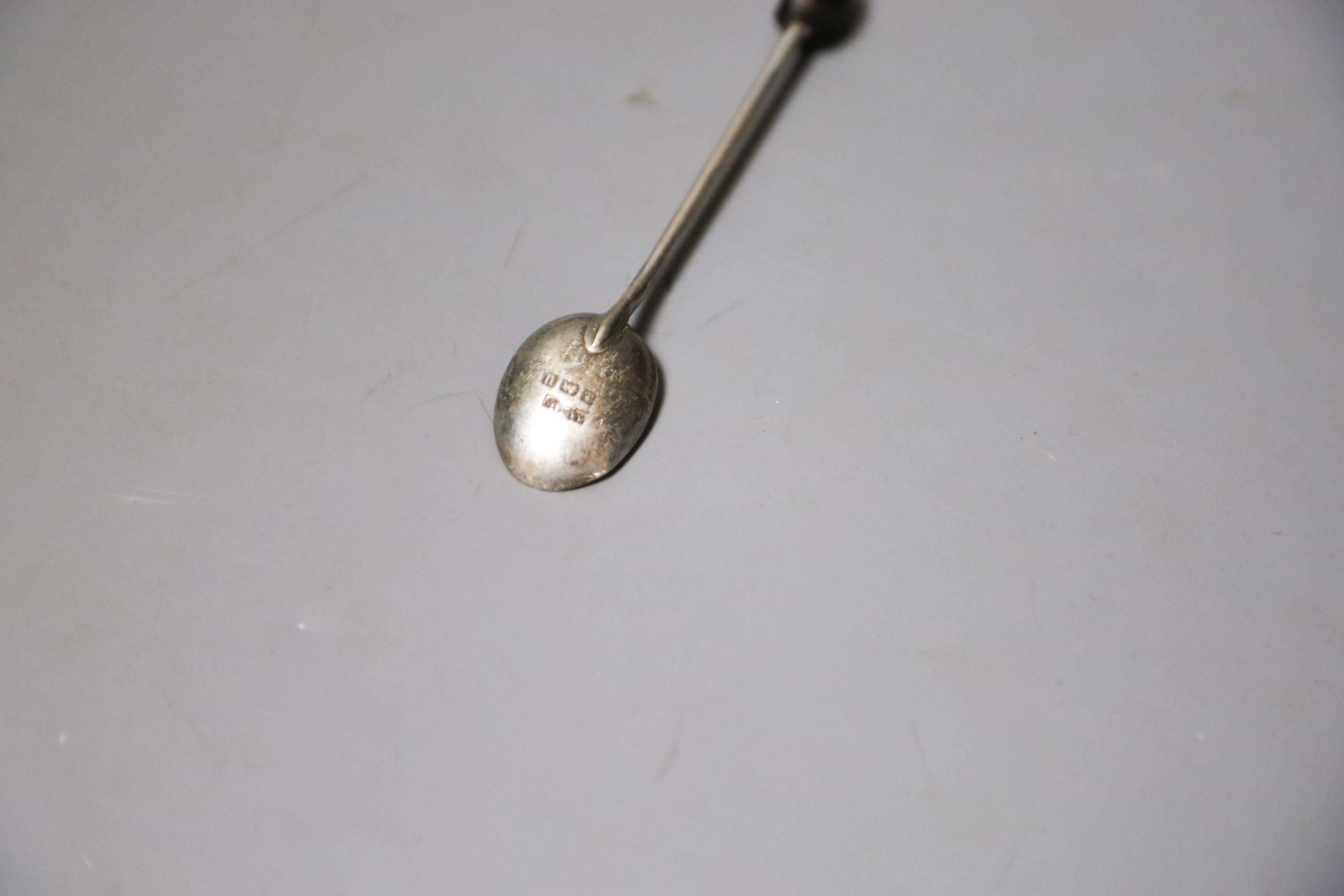 A cased set of six George V silver bean end coffee spoons